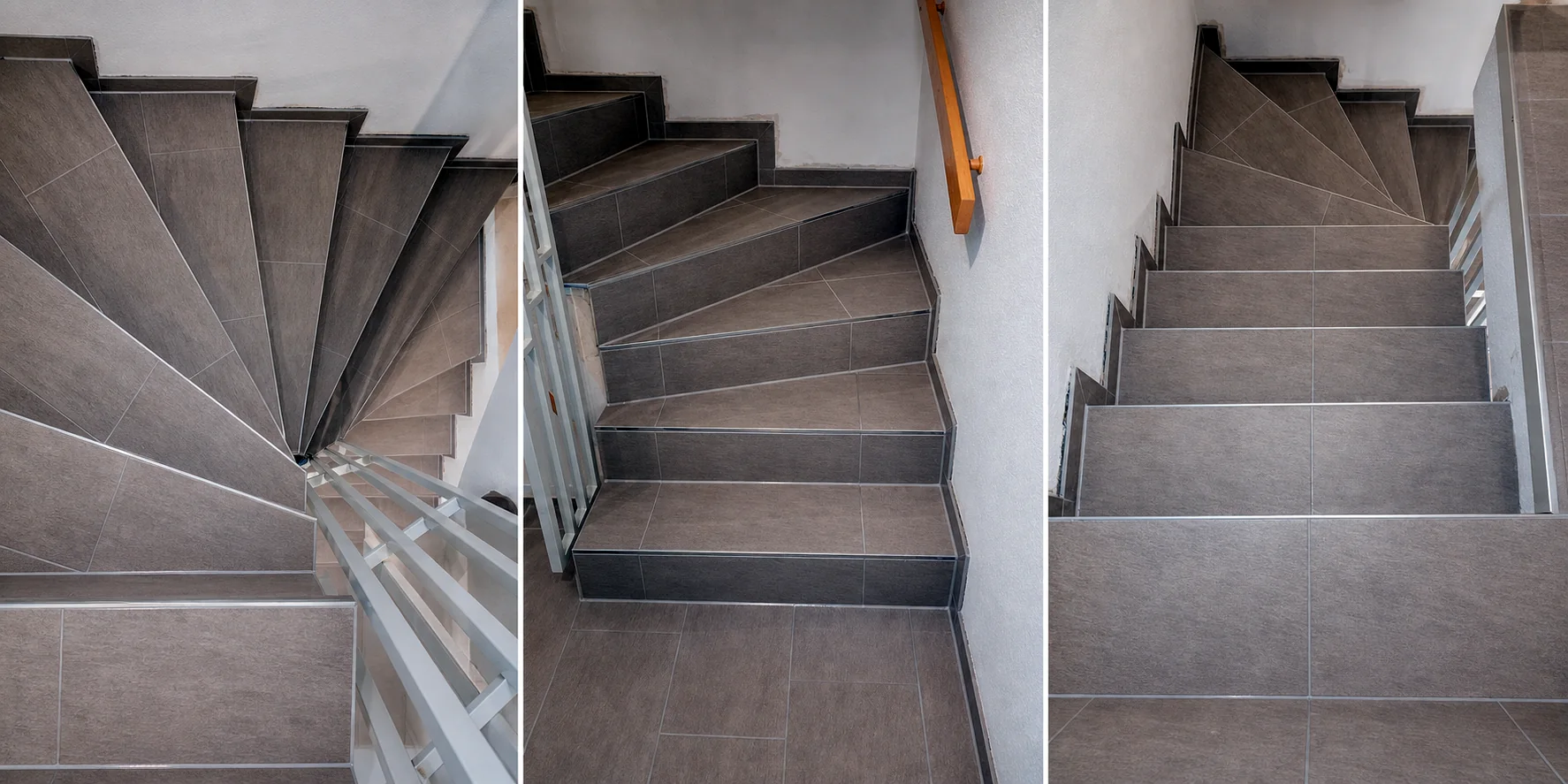 Gewendelte Treppe mit 30 mal 60 Zentimeter großen Fliesen und Edelstahlprofilen an den Stufenkanten